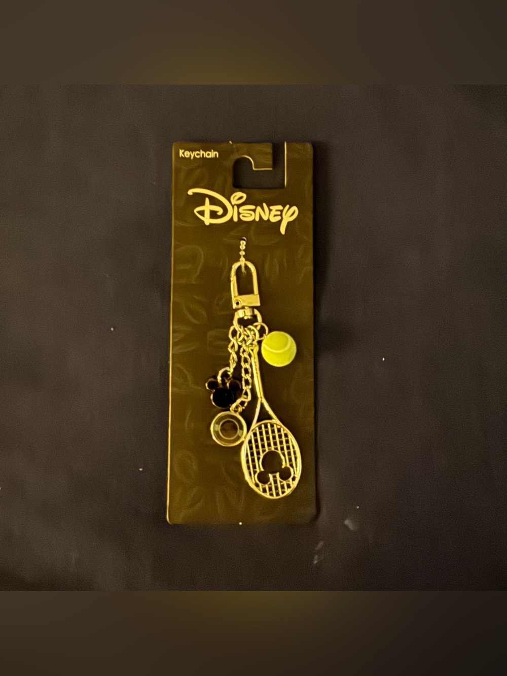 Disney Gold-Tone Tennis Charm Keychain with Black & Yellow Accents